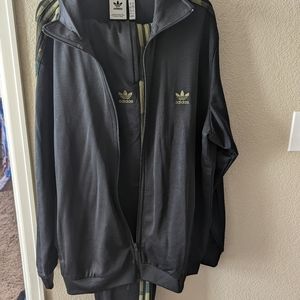Adidas track suit